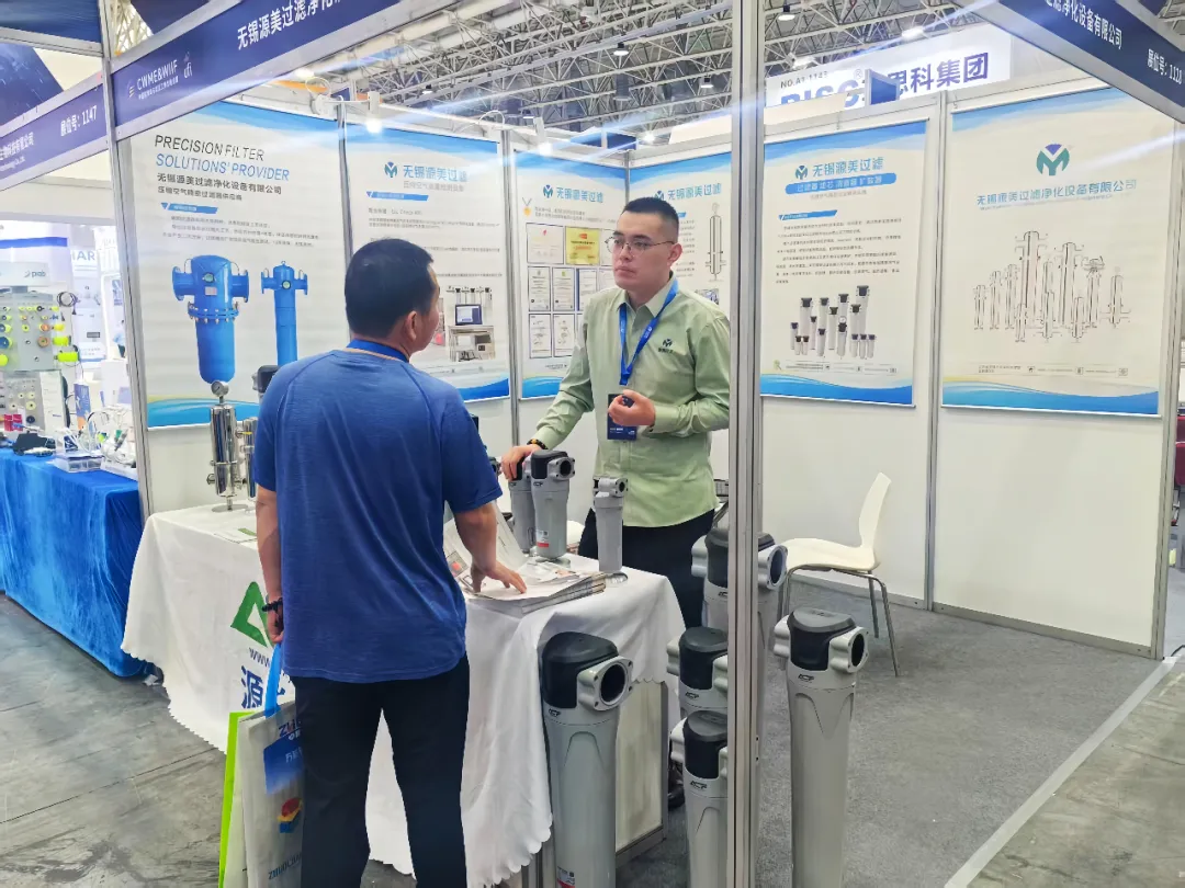 Yuanmei sales staff answer questions for customers at the site